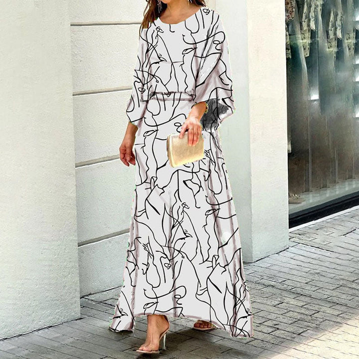 Długa Sukienka w Kwiatowy Wzór | Zwiewny Fason | Elegancki Look na Specjalne Okazje